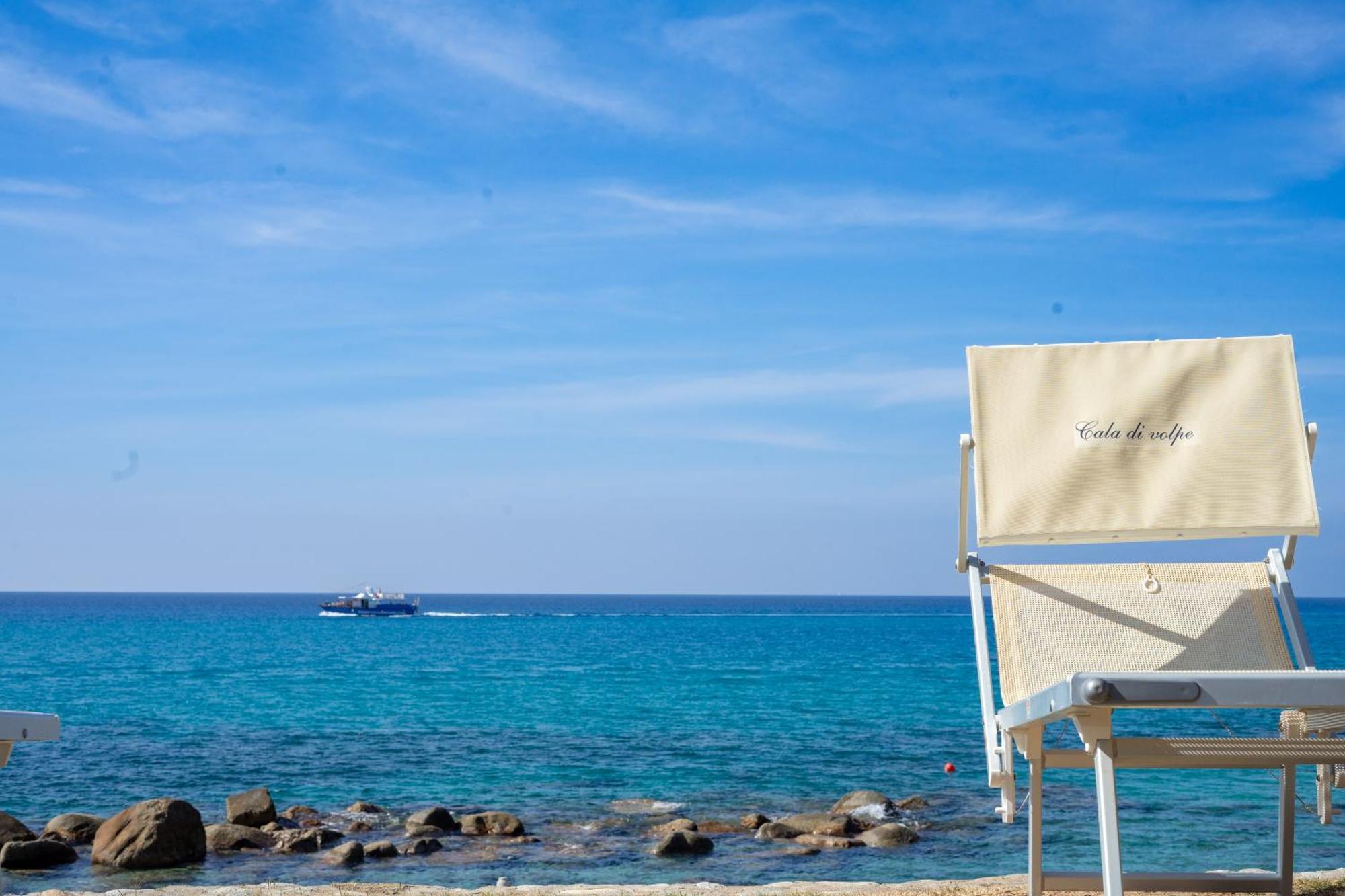 Hotel Villaggio Cala Di Volpe Capo Vaticano Bagian luar foto