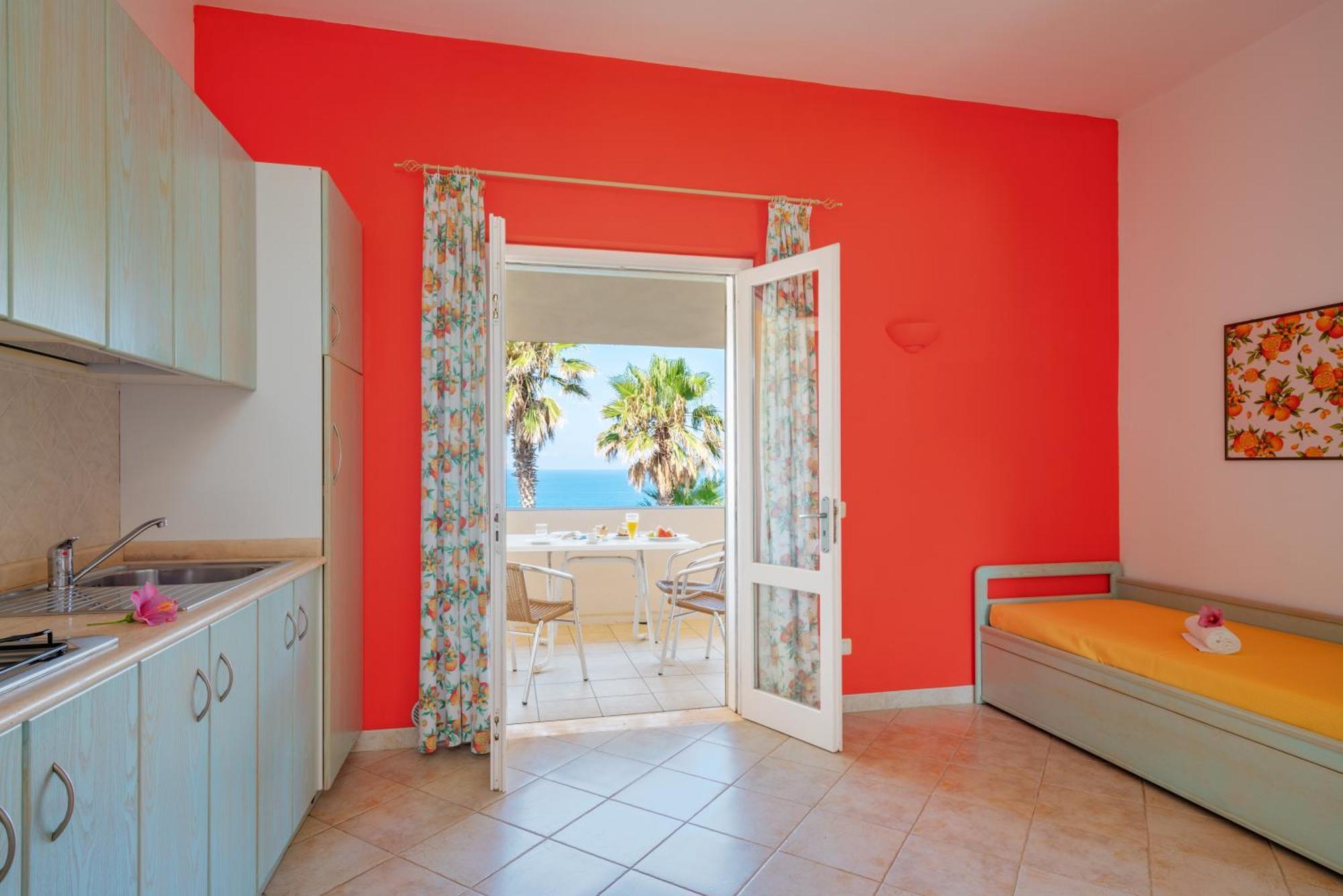 Hotel Villaggio Cala Di Volpe Capo Vaticano Bagian luar foto